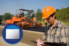 colorado map icon and a paving contractor with paving machinery