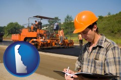 delaware map icon and a paving contractor with paving machinery