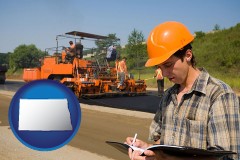 north-dakota map icon and a paving contractor with paving machinery