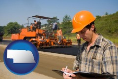 nebraska map icon and a paving contractor with paving machinery